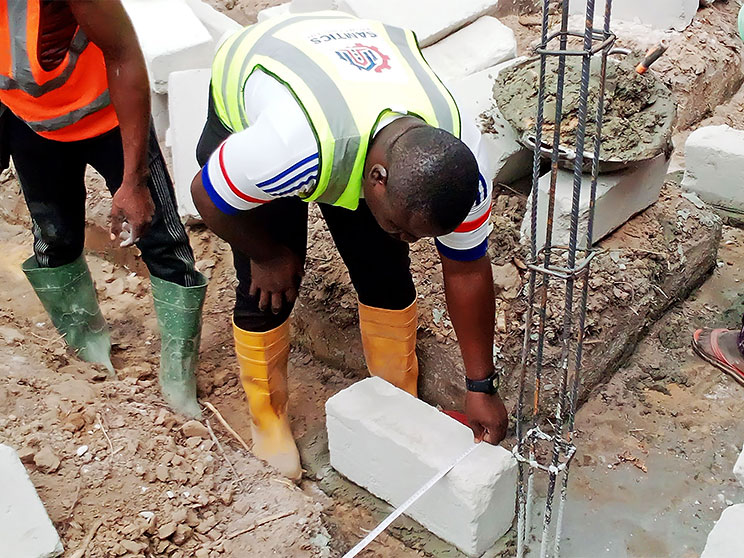 samtics project engineer on site with branded vest